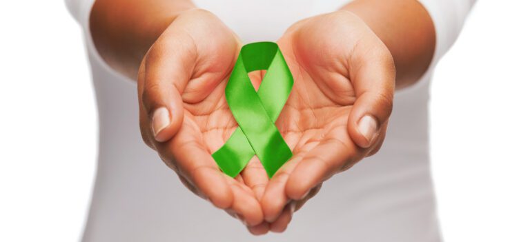 Green mental health ribbon.